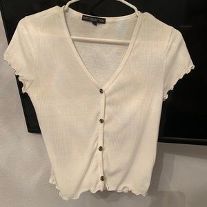 Form-fitted Ruffle Button V-Neck Top